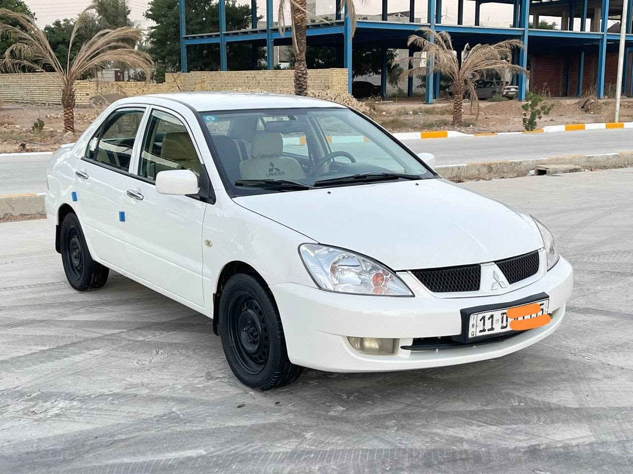 مرحبا لانسر موديل 2011  شركه العامه مكفوله كفاله عامه من صبغ وتبديل رقم بغداد دولي جديد بسمي شخصيآ محرك وكير وحداديه جديده مشيهه جدآقليل همkm 108  وسياره مكفوله كفاله بدون صبغ بدون تبديل وسونار كدامك تأكده منه سياره كلش حلوه  سعره 83$وبيه مجال بسيط انشالله للاتصال *********** رجا أأكد من سونار يله تتصل

