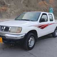 نيسان ٢٠٠٢ • كويسينجاك • دفرنس