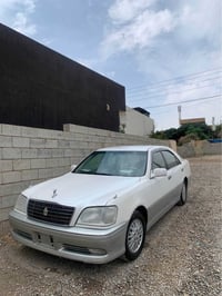 مليكة ٢٠٠٢ • بني • دركسون كهربائي