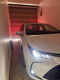 للبيع كورلا هايبرد 2025 ماشيه 13 الف سياره بحاله الوكاله دوشمه درجه او...