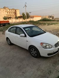اكسنت • ٢٠١٠ • توماتيك
