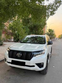 برادو 2023 رقم بغداد / ساز / ماشيه 47000 فول مواصفات  مد نايت  بصمه / ...