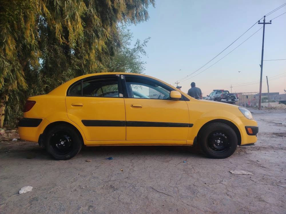 كيا ريو 2009 محرك 1600 رقم انكليزي باسم صاحبهة مصفرة هيئة وغرامات كير ومحرك مكفولات رقم صاحبهة *********** بي واتساب ديوانية, القادسية
