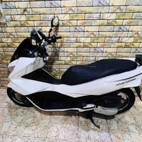 PCX الجيل الثاني مكينة 150  نضيفة برغي ما مفتوح بيها -نسختين من السويج...