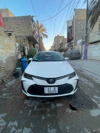 كورلا هايبرد موديل 2024 ام العلامة الزركة باب اول المرغوبة السيارة بيه...