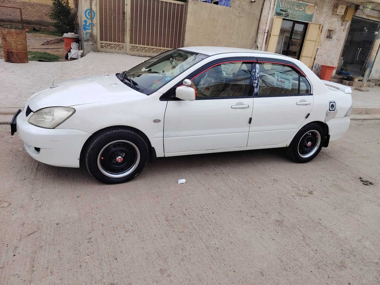 لانسر البيع موديل 2011 رقم بغداد 
سعر 78 بي مجال 
***********
