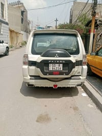 باجيرو 2010 سنوية ب اسمي  محرك 3500  بشده و 15 ورقه   رقمي 07700499791