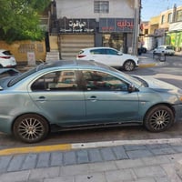 شباب لانسر قرش 2008 للبيع او مراوس  السيارة فول مواصفات للاخير  بصمه  ...