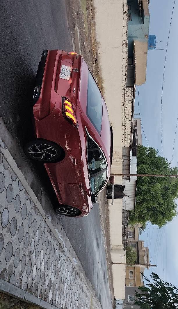 السلام عليكم 
MG GT 2023 Luxury أعلى فئة
وكالة العراق رسميًا
1.5 Turbu— المحرك 
 173 حصان 
قوة 173 hp،
عزم 275 Nm، 
تسارع 0-100 خلال 8 ثواني تقريبًا.
ماشية 37 كيلو فقط
لون مميز دم الغزال 
كير أوتوماتيك 
تبريد قطعتين 
سايد بريك بصمة
اوتو ستوب 
انضمت قيادة
بصمة تشغيل
بصمة بيبان 
فتحة سقف
مري شفط 
كاميرا 360، 
اشاير مري 
كاميرات محيطية
كاميرات عند الاستدارة 
لد نهاري امامي خلفي 
 كشنات جلد مطعم  
كرسي كهربائي،
 مثبت سرعة، 
شاشة، اكتف اندرويد 
 عدادات ديجيتال،
 6 إيرباغ،
Blind Spot،
مانع تصادم، 
تحذير مغادرة المسار.
سيارة كلين بوضع الشركة محرك كير كهرباء 
ملاحظات بسيطة / بارد شبر جاملغ الامامي / كسر قبق الايت خلفي 
رقم بغداد دولي هزة وسنوية جدد تحويل مباشر
السعر 110$
الموقع: بغداد / حي العامل 
اتصال + واتساب *********** بغداد, العراق
