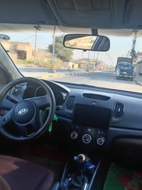 كيا سيراتو للبيع موديل ٢٠١١بيها قطعتين باب الصدر وباب سايق السعر١٠٤وبي...