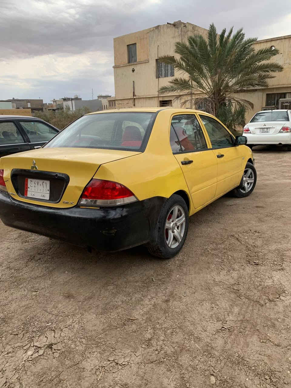 لانسر ٢٠٠٩ • محرك مكفول • رقم بغداد