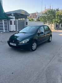 بيجو 307 موديل 2005 رقم بغداد انكليزي سنويه وهزه وارقام كلهه جديده سنو...