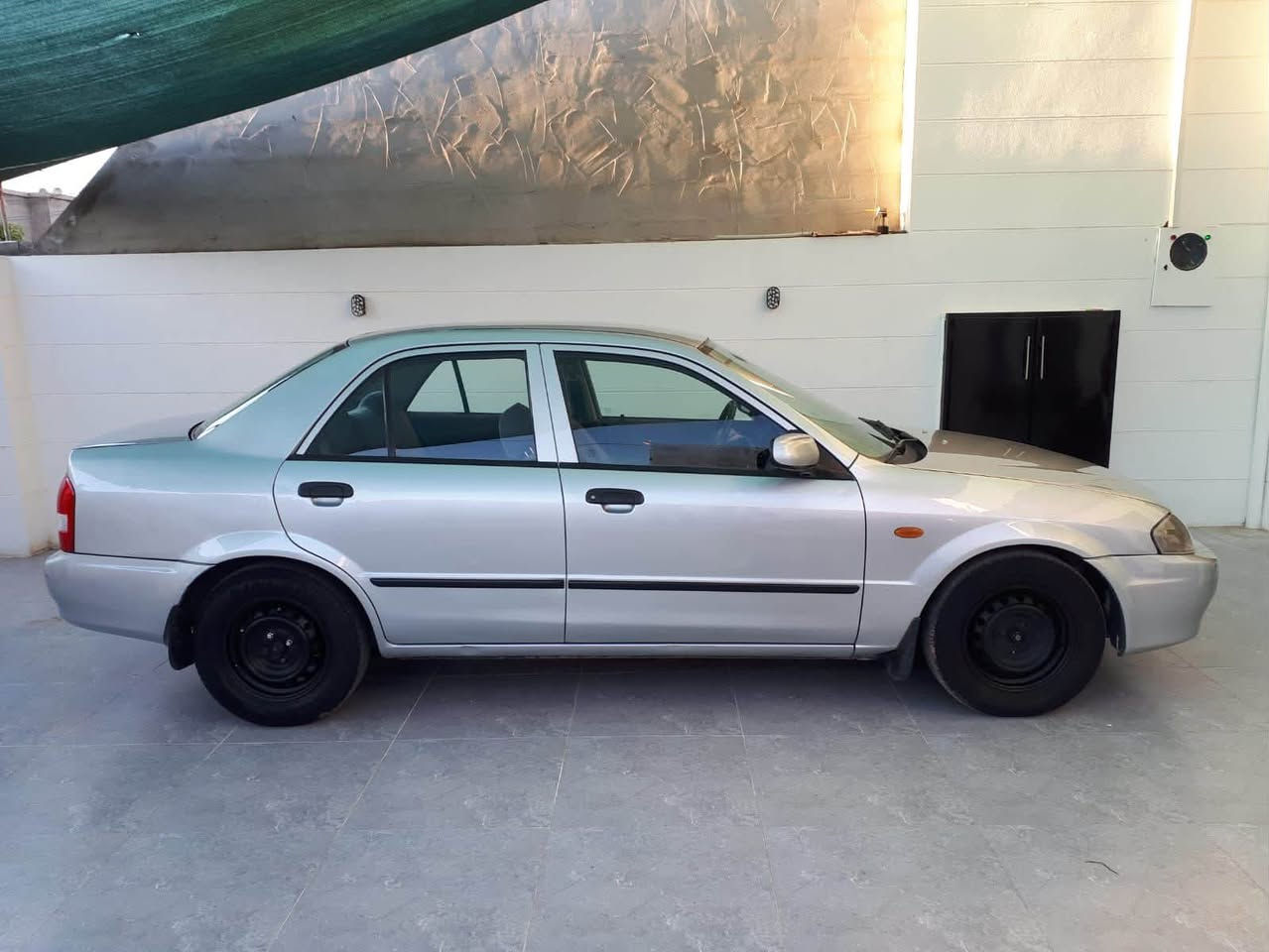 للبيع مازده 323موديل2000كير ئوتوماتيك تبريد جام كهربائي بي كوبون بنزين رقم اربيل سنويه جديد لحد2029بسمي صبغ عام بدون ضرر سعر60بي مجال***********/***********مكان سياره كركوك

