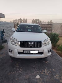 برادو 11.. 4 سلندر 2700 رقم بغداد فول اوتماتيك عدا الفتحة ب 205 وبيها ...