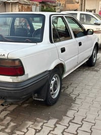 كورلا ١٩٩٠ • باسمي • بدون صبغ
