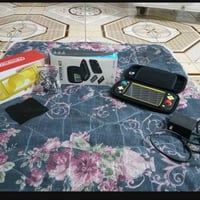 بنات جهاز نتيندو سويتش لايت شاشه لمس جديد مستعمل قليل جدا كاتونته وياه...