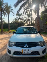ميتسوبيشي L200 • 2011 • ميكانيك مكفولة