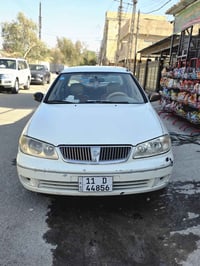 اربع انيسان سني ياباني 2009 قبق ابيض السيارة بلادية بيهة بارد بل جاملغ...