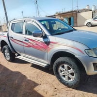مستوبيشي 2011 كاز رقم بصرة ، مكينة محوره  الرقم : 07803137934