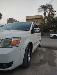 دوج كرفان 2008 7راكب كشنات بلع  محرك 3800 فول مواصفات  3قطع تبريد  كير...