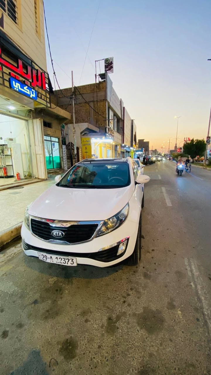 سيارة سبورتج 14 خليجي كامل مواصفات رقم واسط باسمي مكانواسط السعر ١٤٠ وبيه مجال رقم ***********
