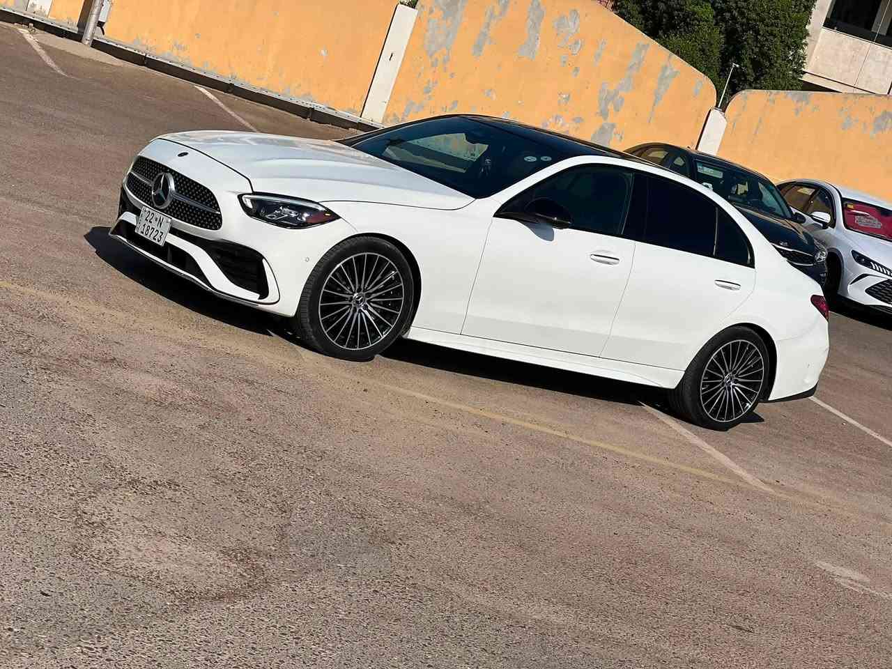 مارسيدس c300 AMG موديل 2024
زيرو ماشية. فقط 20 الف كيلو متر 

طراز  AMG فول مواصفات 

ثلاث انظمة قيادة 

1️⃣سبورت

2️⃣سبوت بلاس

3️⃣ايكو

اختار النظام الي يعجبك 

السيارة فول الفول موصفات 

1- نظام القيادة الذاتية والمساعدة (ADAS) الرادار والكاميرات

‏2-  (DRIVE PILOT ) : يعتبر من أكثر أنظمة القيادة الذاتية من المستوى 3/4 تطوراً في العالم. في ظروف معينة (طرق سريعة مزدحمة)، يمكن للسائق تسليم القيادة الكاملة للسيارة وتشغيل قوانين أو مشاهدة فيلم.

3- نظام المساعدة على التوجيه الذكي (Active Steering Assist):** يحافظ على مسار السيارة في منتصف المسار، حتى في المنحنيات اللطيفة.

4- مساعد الحفاظ على المسار (Active Lane Keeping Assist): يكشف علامات المسارات ويتدخل بتوجيه عكسي لطيف إذا بدأت السيارة في الخروج عن المسار دون استخدام الإشارة.

5- مكابح الطوارئ الذكية مع (Active Emergency Stop Assist): تكشف المشاة والدراجات والسيارات، وإذا لم يستجب السائق، توقف السيارة تلقائيًا.

6- مساعد التكيف مع السرعة (Active Distance Assist DISTRONIC): تحكم تكيفي في السرعة يحافظ على مسافة آمنة عن السيارة التي أمامك، حتى في الزحام، ويتوقف ويعيد التحرك تلقائيًا.

7- مساعد تغيير المسار (Active Lane Change Assist): بمجرد تشغيل إشارة الاتجاه، تتأكد السيارة من أن المسار خالٍ وتنفذ تغيير المسار بسلاسة.

8- نظام التحذير من الاصطدام الأمامي (Front Collision Warning)

9- مساعد الخروج من المرآب الذكي (Remote Parking Assist): يمكن للسيارة أن تدخل أو تخرج من مكان ضيق (مرآب أو موقف) عن بُعد باستخدام تطبيق الهاتف الذكي، بدون وجود السائق داخلها.

10- رادار بعيد المدى (Long-Range Radar): للمسافات الطويلة على الطرق السريعة.

11- رادارات قصيرة المدى (Short-Range Radars): في الزوايا الأربع للسيارة للكشف عن العوائق أثناء المناورة وتغيير المسار.

12- أجهزة استشعار أولتراسونيك (Ultrasonic Sensors): للمسافات القصيرة جدًا أثناء الركن.

13- الشاشة ( MBUX Hyperscreen ): لوحة قيادة رقمية كاملة بشاشة كبيرة الحجم وشاشة مركزية ضخمة 

14- نظام MBUX (Mercedes-Benz User Experience): نظام الوسائط المتعددة الأكثر ذكاءً، يتعرف على الكلام الطبيعي ("مرحبا مرسيدس، أشعر بالبرودة" أو "اضبط الإضاءة على اللون الأزرق").

15- مقاعد أمامية ذات تحكم كهربائي ذاكرة  وتهوية وتسخين 

16- التحكم بالمناخ الذكي من 4 مناطق (4-Zone THERMATIC): حيث يمكن لكل راكب ضبط درجة الحرارة والتدفئة والتهوية حسب رغبته.

17- الإضاءة البيئية AMBIENT LIGHTING:مع 64 لونًا لتختار منهم، وإعدادات إضاءة متحركة ومتعددة.

18- سقف بانورامي كهربائي (Panoramic Sliding Sunroof)

19- فتح وإغلاق وإقلاع السيارة بدون مفتاح (Keyless-Go) 

20- شحن لاسلكي للهواتف الذكية 

21- نظام المساعدة على الكبح (BAS)

22- نظام منع انغلاق المكابح (ABS)

23- نظام صوتي عالي الجودة من Burmester مع 15 مكبر صوت.

 

24- دعم كامل لتكامل الهواتف الذكية عبر Apple CarPlay وAndroid Auto

25-دركة رياضية على شكل حرف D

26- داخل احمر ملكي 

السعر : 34  وبيها  مجال

*********** متوفر واتس اب 

بغداد - اليرموك
