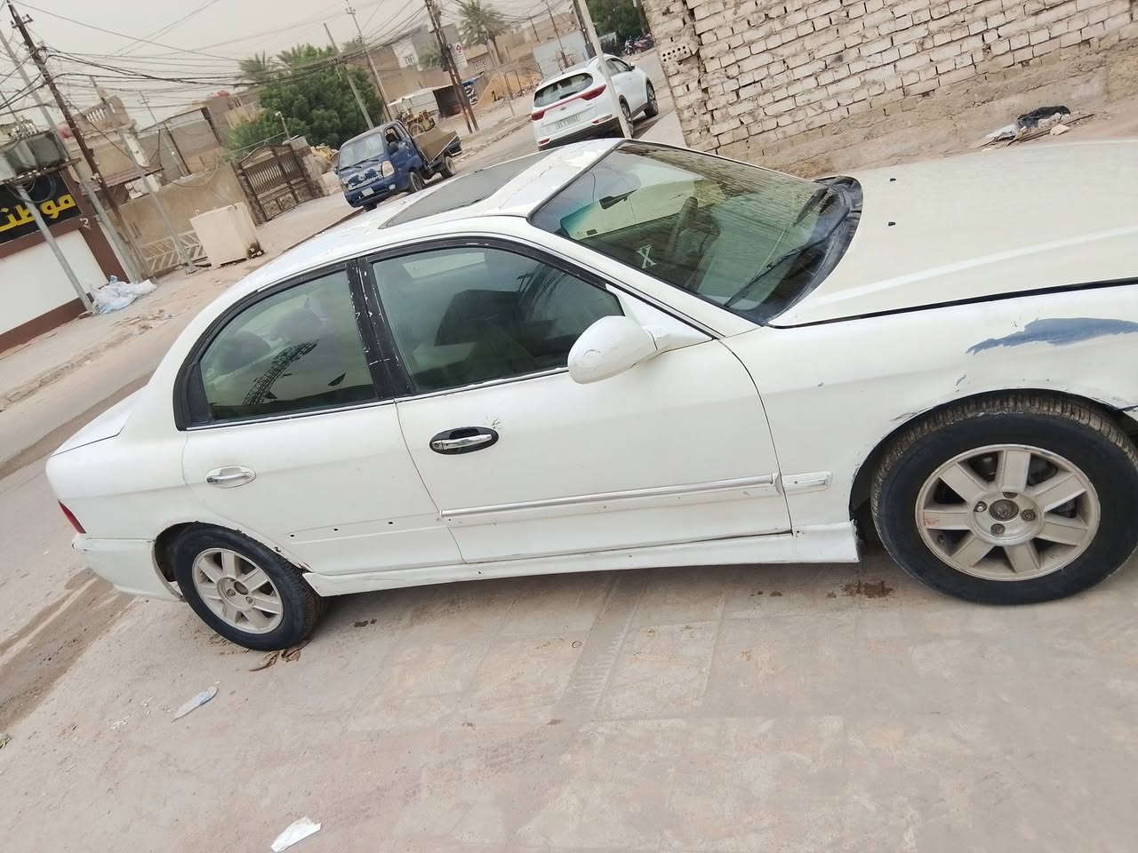 اوبتما ٢٠٠٤ • ٦ سلندر • مكينة ٢٧٠٠