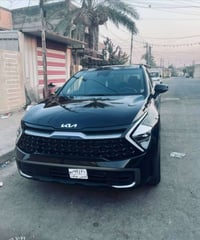 سبورتج موديل ٢٤ فول رقم بغداد بسمي السياره ماشي ٢٥ الف حادثه بنيد مبدل...