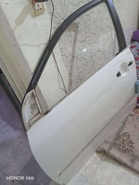 من رخصه الادمن المحترم باب كورلا بيكاجو 2006 بلاديه امامي جهة السايق ف...
