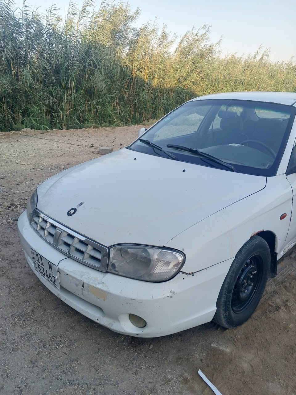 السلام عليكم سيارة كيا سبكترا موديل 2000كير عادي  رقم بغداد باسمي السعر 28 رقم التلفون *********** او مراوس حسب القناعه
