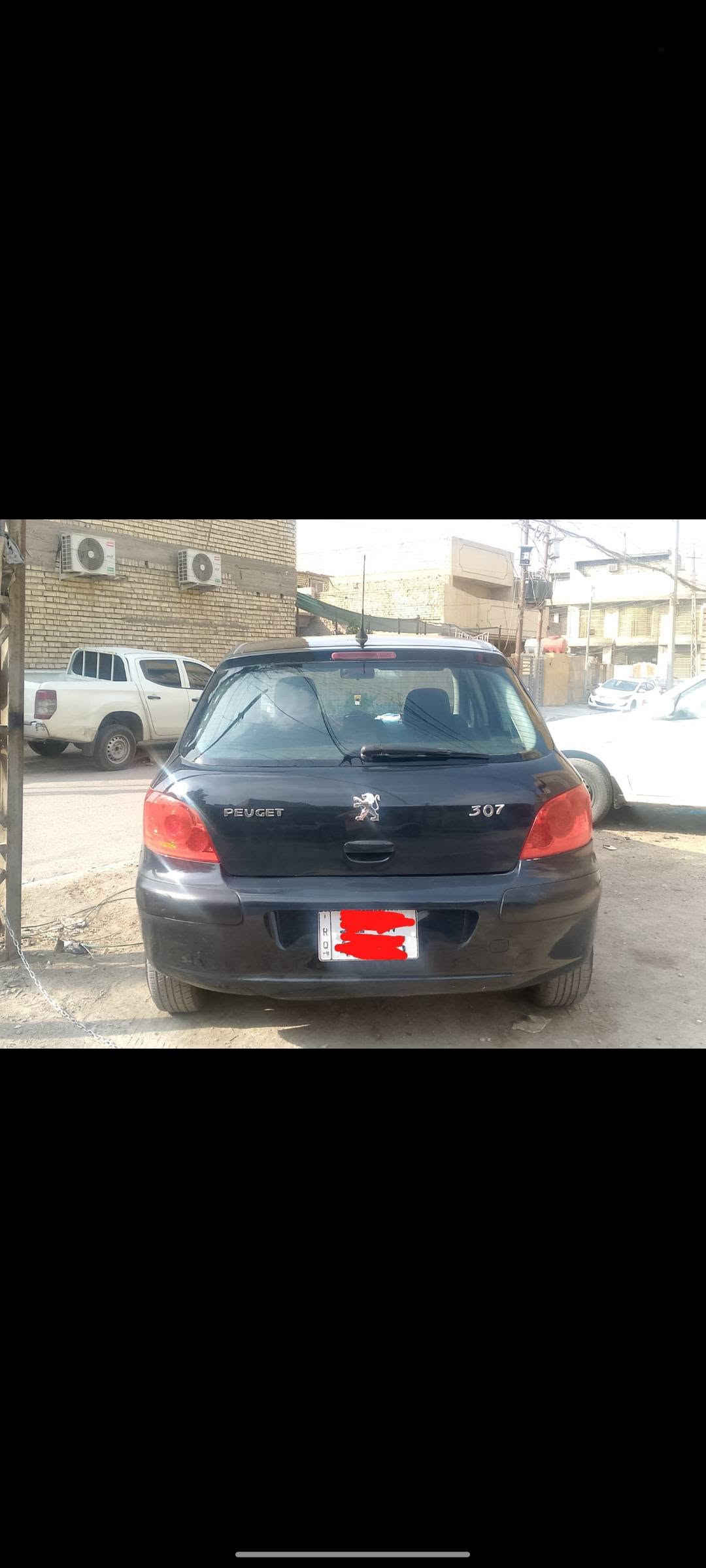 بيجو ٣٠٧ • ٢٠٠٦ • رقم بغداد
