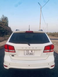 جورني ٢٠١٤ • ٧ راكب • رقم بغداد