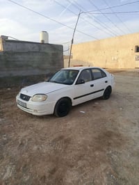 اكسنت فيرنا • ٢٠٠٤ • كوت شارع النفط