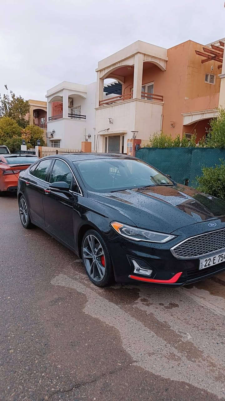فورد فيوجن 2020 تيتانيوم
2000 توربو حادث السياره جاملغ خلفي جهت اليسره وبيها صبغ نص بنيد صور الحادث مرفوقه السياره بدون يرباك ماشية 55 حقيقي 
مواصفات التيتانيوم معروفه
-ابواب السائق والراكب
الامامي بصمه
-تشغيل عن بعد
-اشاير بالمري
-حساس نقطه عمياء بالمري
الجانبيه
-مرايه الخلفيه تعتيم تلقائي
"اوتودم "
-رادار للتحذير امامي
-قياده شبه ذاتيه متابعه
خطوط الشارع
-كاميرا خلفيه دواره
-حساسات خلفيه
-داخل جلد اسود
-مقاعد اماميه كهربائيه

-تدفئه وتبريد مقاعد اماميه
-تدفئه ستيرن
-زجاج السياره ٤ اوتو صعود
زجاج السياره +السلايد روف غلق وفتح من بصمه السياره
-رمز من لفتح السياره
-نظام سماعات سوني 12
سماعه السياره بسمي تحويل مباشر السعر ١٣٥ وبيها مجال شي بصيط مكان السياره أربيل رقم تلفون ***********
