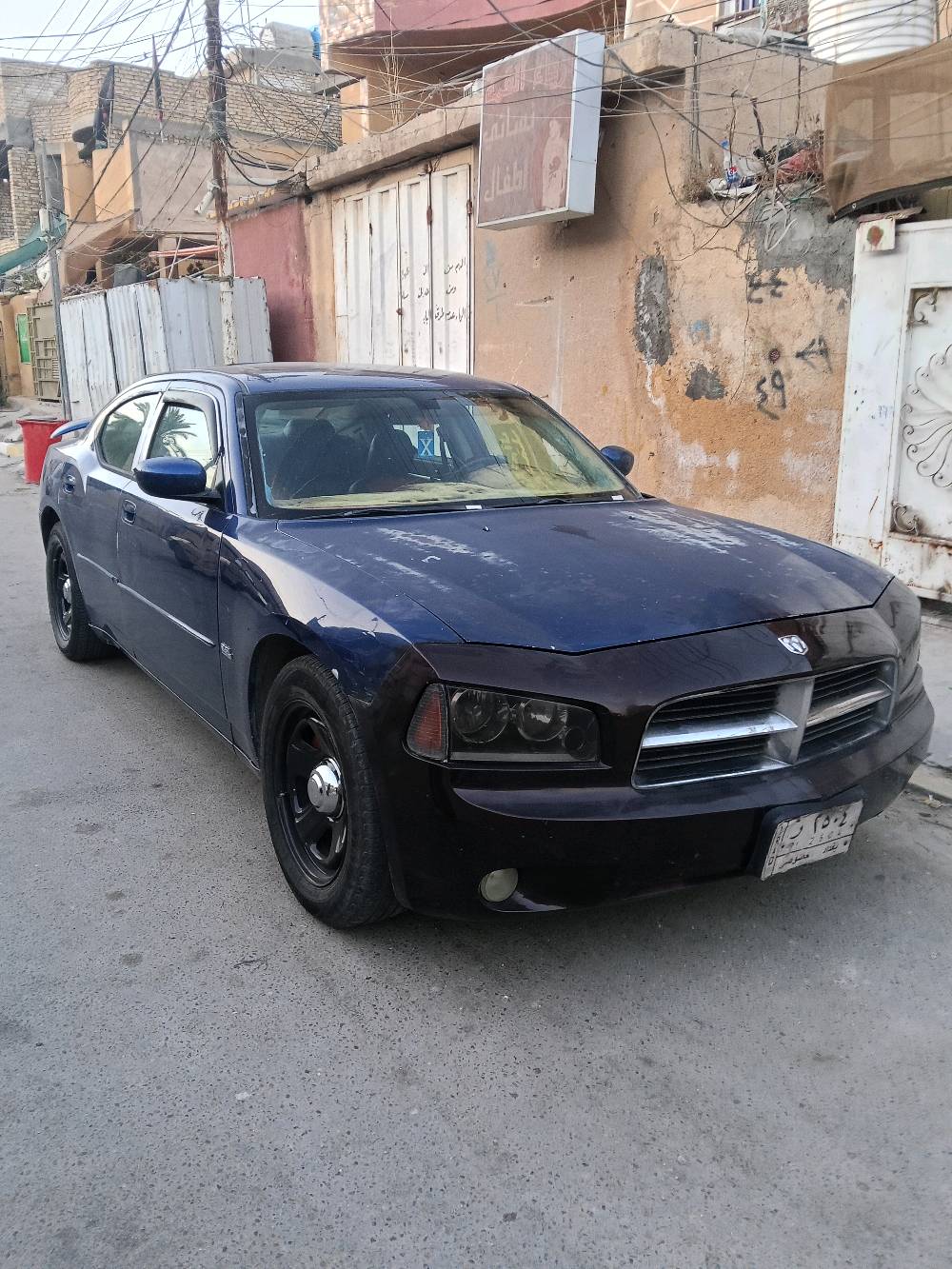 جارجر موديل2010 فول فتحه تحكمات ستيرن شاشه قلاب كشن جلد كهرباء وارد كندي جاملغ امامي وخلفي رقم بغداد سعر90