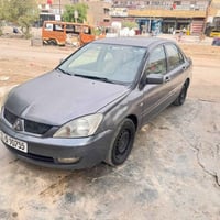 لانسر • ٢٠١١ • بغداد الأمين