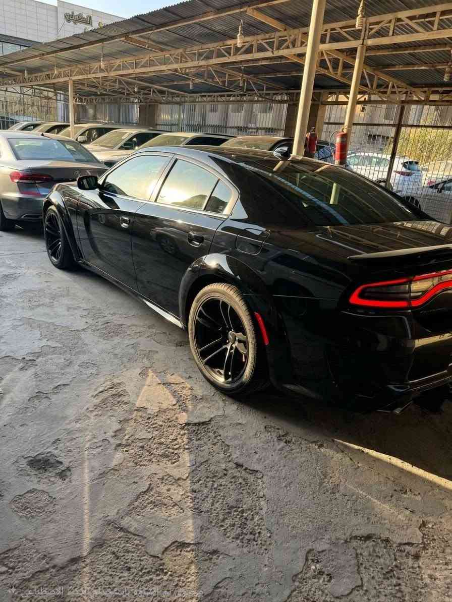 🔥 Dodge Charger Scat Pack Widebody 2022 للبيع 🔥
او مراوس 
إذا تدور على جارجر تجمع بين القوة، الهيبة، والفخامة… هاي السيارة تستاهل تشوفها 👌🏻

🚘 Charger Scat Pack Widebody
📅 موديل 2022
💨 محرك 6.4L HEMI V8
⚫ لون أسود
🔴 داخلية حمراء
🛣️ الممشى 24,000 ميل فقط
⚙️ قير أوتوماتيك 8 سرعات
💪 Widebody الأصلي
🔧 ستوك بالكامل

Scat Pack يعني تحصل على محرك الـ6.4 HEMI V8 المعروف بقوته وصوته وأدائه، والسيارة بعدها ستوك بدون تعديلات، وهذا الشي مناسب للي يريد سيارة على وضعها الأصلي.

والمميز بيها الممشى قليل جداً: 24 ألف ميل بالنسبة لموديل 2022.

باختصار:
🔥 Widebody
🔥 Scat Pack
🔥 6.4 HEMI V8
🔥 أسود × أحمر
🔥 24 ألف ميل
🔥 ستوك
🔥 موديل 2022
حادث جاملغ يسره بنيد و بيهه ملاحضات بسيطه 

سيارة للّي يعرف بالجارجر ويعرف قيمة الـScat 
💰 السعر: 288 وبيهه مجال 
📞 للاستفسار: ***********

