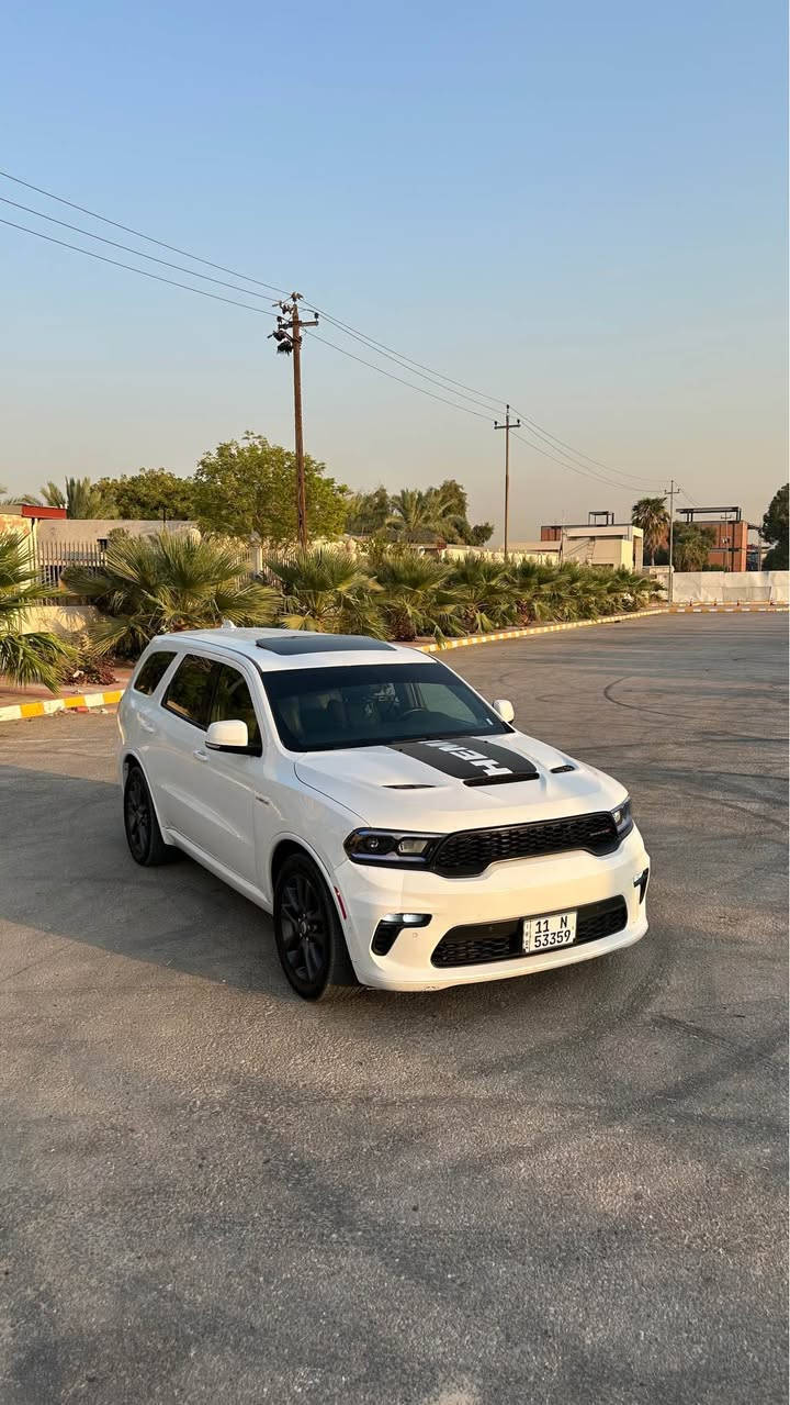 ‎دوج دورانكو ارتي 
Dodge Durango R/T   .
‎الموديل : 2021  . (وارد كندي كلين تايتل استيراد خاص زيرو) .
‎المحرك : V8 . 5.7L  .
‎العداد : 90 الف  .
‎السعر : 310 ورقه وبيه مجال بسيط
‎رقم بغداد
سيارة جاهزة ومصروف عليها اهواي ماعايزه برغي اخت الجديدة   .
‎المواصفات:  
‎* تحذير النقطة العمياء . 
‎* حساسات امامية وخلفية .
‎* شاحن هاتف لاسلكي (وايرلس ).
‎* فتحة سقف (سلايد) . 
‎* مقاعد من الجلد مع كنتارا الفاخر. 
‎* مقاعد كهربائية مع ذاكرة لحفظ وضعيات الجلوس. 
‎* مقاعد تبريد وتدفئة. 
‎* تدفئة مقود القيادة. 
‎* مقود رياضي مع تحكم كهربائي. 
‎* مصابيح امامية زنون مع LED .
‎* كشافات ضباب LED . 
‎* شاشة 10.1 أنج .
‎* نظام ملاحة (GPS) . 
‎* تشغيل عن بعد . 
‎* ويل قياس 20 أنج . 
‎* صندوق كهربائي . 
‎* بلوتوث تلفون .
‎* محدد سرعة . 
‎* كاميرا خلفية .
‎* كير شفتر ستيرنك .
‎* صف ثالث من المقاعد 7 راكب . 
‎* اطفاء وتشغيل اوتماتيكي Auto start . 
   للاستفسار *********** النجف, العراق
