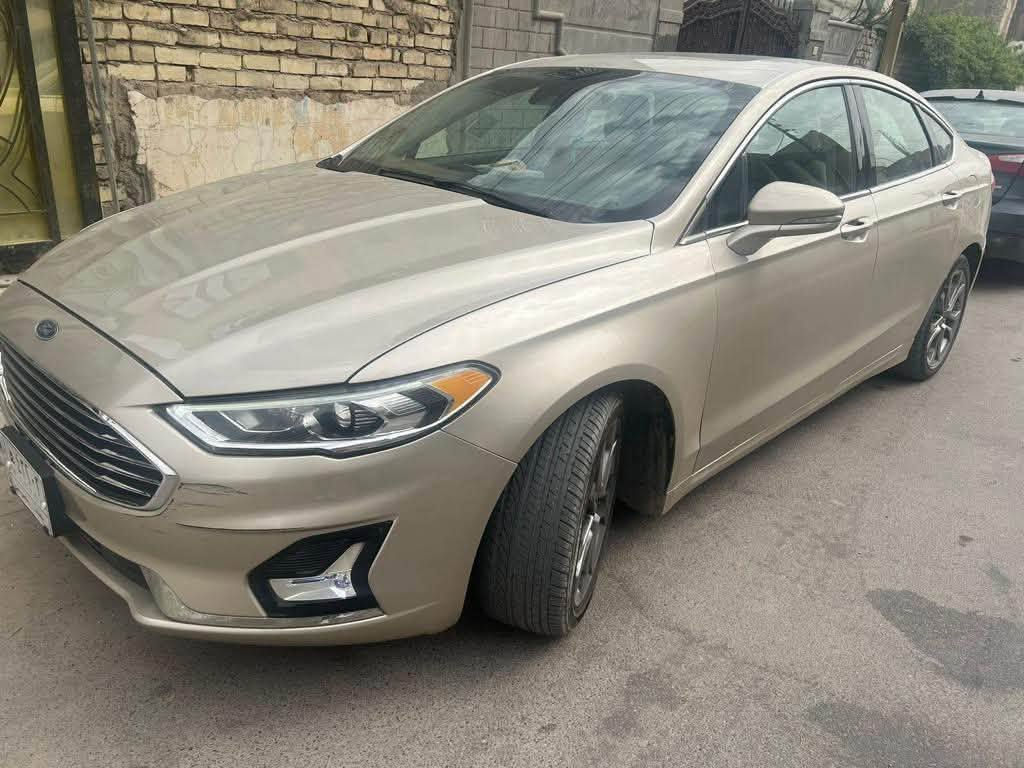 سيارة فورد فيوجن 2019 وارد امريكي (للبيع فقط )
الموصفات : 
- SEL(SEL )فوووول فووول  مواصفات للاخير 
-محرك 1500 تيربو
- كشنات جلد كهربائي بلادي  
- خزن ميموري مقعد السائق 
- حساسات امامي وخلفي ويمين ويسار 
- الصندوق كهربائي بصمة 
‏-  الابواب بصمة 
- باسورد باب السائق 
- التشغيل بصمة 
-تشغيل عن بعد 
-شاشة كبيرة وايضا شاشة ملاحة 
-كامرة دوارة وحساسات توقف ذاتي 
- اوتو هولد 
- هاند بريك كهربائي 
‏-الايرباكات كلهة سليمة
-ضربتهة بأمريكا جاملغ خلفي 
السيارة خير من الله دينار ما تتصرف عليهة 
اقتصادية بصرف البانزين
رقم بغداد بأسمي تحويل مباشر 
السعر :108$  وبيهة مجال تدلل
صور الحادث موجودة بالمنشور 
للاتصال على الرقم  ***********
