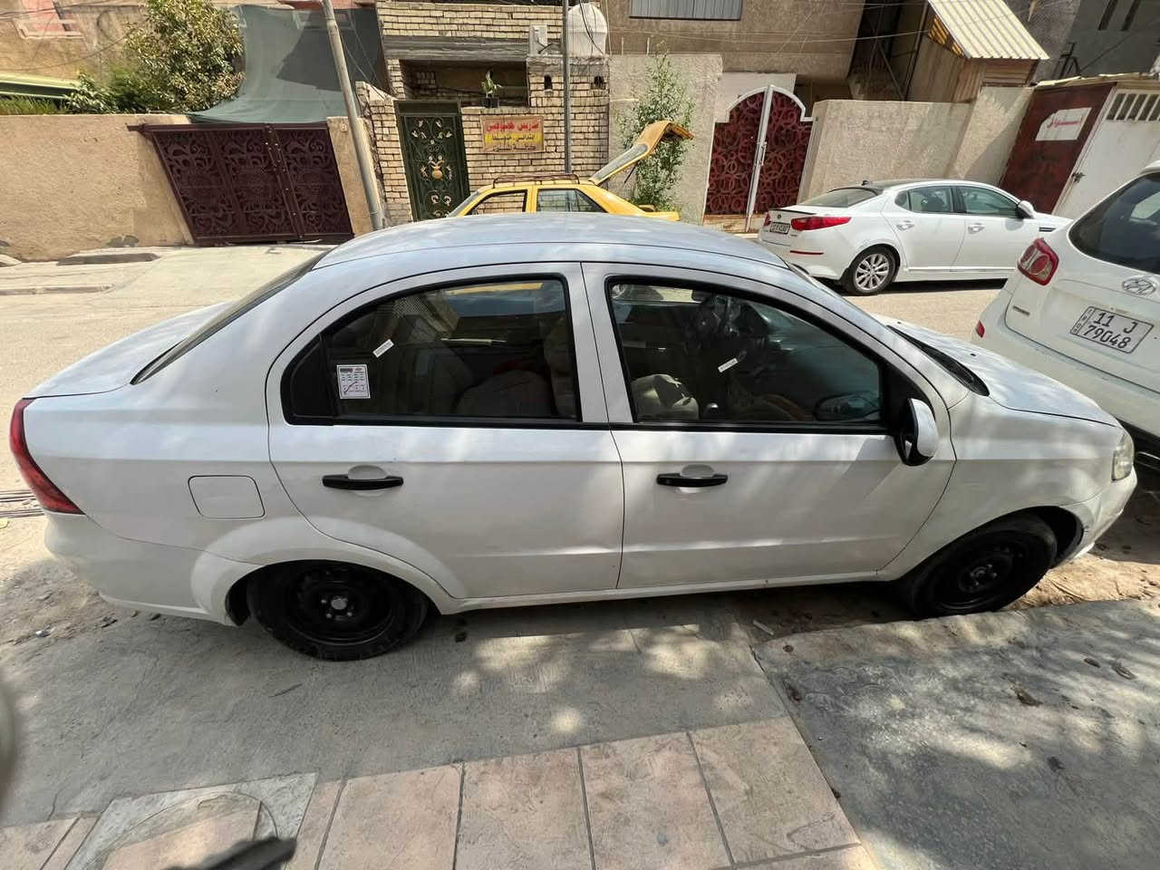 السلام عليكم افيو 2009 خليجيه سيارة كامله مكمله من كل النواحي كير مكينه صدر  تبريد كله خير من الله محرك 1500 مفتوح من الشركه العامه داخل صاج شاشه داعمه نظام كار بلي السيارة بأسمي هزه جديد ثاني يوم التحويل بيه الجاملغ الامامي الايمن مصبوغ بمكانه اثر شخوط وهلال خلفي والباقي كفاله السعر61 العنوان بغداد حي المواصلات   رقم الهاتف ***********
