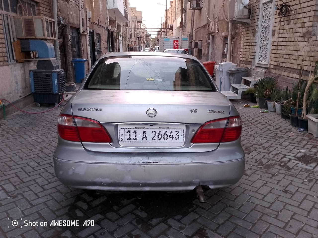 نيسان مكزمه موديل ٢٠٠٤
رقم بغداد نكليزي هزه جديده 
مكينه وكير خير من الله
تبريد شغال 
غرفه نظيفه
حداديه
السعر ٣٧
مكان بغداد قريب التربيه الثالثه حي الامانه
‏‪***********‬‏

نص مكتوب في الصور:
- Shot on AWESOME A70