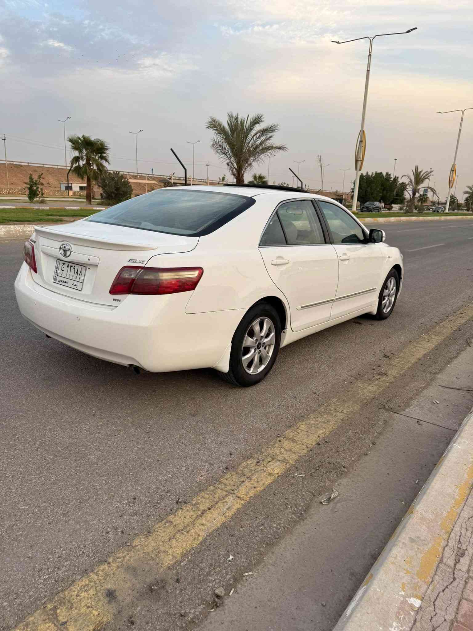 كامري ٢٠٠٩ • بدون صبغ • رقم بغداد