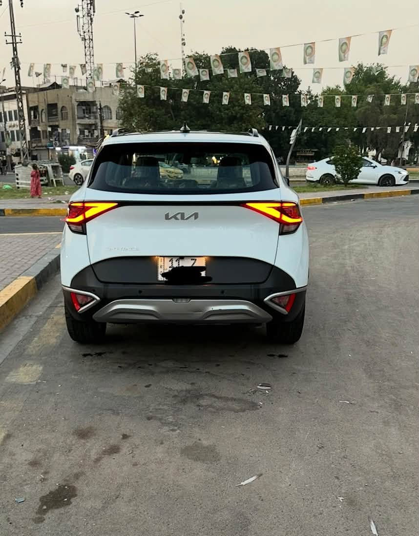 كيا سبورتج خليجي  ٢٠٢٥
فول 1/1بالسبورتج الخليجي
عداد المسافة المقطوعة/٢٣  الف كم
  ضمان  الشركة  وبعدها داخل الضمان مكفوله من كل شي 🔴🔴🔴وقبل ٢٠ يوم امبدل دهن وفلاتر للاستفسار الاتصال ***********‬
العنوان : بغداد الاعظمية 
السعر المطلوب /
( ٢٣٠ )$ دولار يعني دفترين 30　ورقة 
 المواصفات /
- وارد خليجي 
- رقم بغداد ‎
‏‌‎ - بانوراما 
- بصمتين وتشغيل عن بعد 
‏‌‎ - سعة المحرك 2.0L
‏-‌‎ مرتبط بناقل حركة أوتو 6 نمر
‏‌‎ - عدد AIR BAG8
‏‌‎ - حساسات أمامية 
‏‌‎ - حساسات خلفية
‏‌‎ - لايت زينون + LED
‏‌‎ - كشافات 
‏‌‎ - بك لايت LED
‏‌‎ - ويل كب 19
‏‌‎ - قبضات أبواب من الألمنيوم
‏-‌‎ اريل نفكيشن
‏-‌‎ تشغيل عن بعد 
‏‌‎ -فتح الصندوق كهرباء ذكي 
‏-‎ دشبول شاشة 
‏‌‎ - شاشة Apple Car play 
‏‌‎- كاميرا دوارة
‏‌‎ - الانارة الداخلية LED
‏‌‎ - المقاعد صحراوي قماش وتدفئة بالكشنات وستيرن تدف‏‌‎ئة - مثبت السرعة Cruise 
- الأوامر الصوتية
‏‌‎- أوضاع القيادة  Drive Mode
‏‌‎ - فحص أنظمة السيارة 
‏‌‎ - حساسات ضغط اطارات 
‏‌‎ - شفتات مقود
‏‌‎- تبريد شاشة
‏‌‎ - هاند بريك بصمة 
‌‌‏- ABS 
‌‌‏ - Auto Hold    أوتو هولد
‌‌‏- ISO Fex        ايزو فكس
‏‌‎- نظام مانع الانزلاق
‏‌‎- نظام نزول المنحدرات 
‏‌‎- اشارة في المرايا الجانبية
‏‌‎- مخرج منفذ الطاقة 
‌‌‏- رادارات جانبيه مع رادار خلفية 
-شاحن هاتف Wireless
