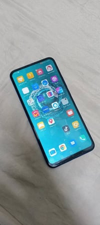 هونر 9X • ١٢٨ • شاشة أصلية
