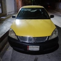 لانسر • 2010 • كالار