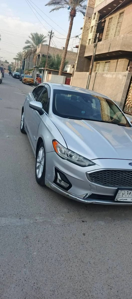 🚘 للبيع فورد فيوجن SE هايبرد – موديل 2019
رقم الشاصي والسونار ناشرهن

للتواصل : ***********
بي واتساب 
🔹 الفئة: SE Hybrid
🔹 المحرك: 2000cc هايبرد
🔹 الممشى: 95 ألف ميل تقريبًا / بحدود 150 ألف كم
🔹 السيارة هايبرد كاملة

🛠️ أضرار السيارة موضحة بالسونار كامل 
• ضرر بالبونيد
• ضرر بالجامليغ الأمامي جهة عكس السائق
• بارد بالجامليغ الخلفي
• طخطخان خفيفة، موضحة بالفيديو
• بمعلومات امريكا مابيها حالو هنا بالفحص كلي بيعة كم حالوبه اتوقع من ذبت حالوب هنا

✅ الشاصي مكفول: بس جهة الضربه سحبه خفيفه كلش معدل يعني بدون شاصي السياره .

✅ المكينة مكفولة
✅ الكير مكفول
✅ بطارية الهايبرد مكفولة
✅ منظومة الهايبرد/المحرك الهجين مكفولة

📹 الفيديو يوضح أضرار السيارة وحالتها بالتفصيل، والجاد يگدر يشوف كلشي بنفسه.

💰 السعر:  $  *********** 

📍 بغداد / الكرخ

السيارة مثل ما موضحة بالإعلان، وماكو أي إخفاء للضرر.

فئة SE 
كرسي كهربائي / الكير ماوس / الهاند بريك بصمة / كامرة خلفية / تحكم على المنحدرات / مستشعر وقوف / بصمة / شاشة مراقبة النقطة العمياء / نظام فرملة الطوارئ / ابل كاربلاي / وباقي المواصفات  
حالة التبريد ممتازة
