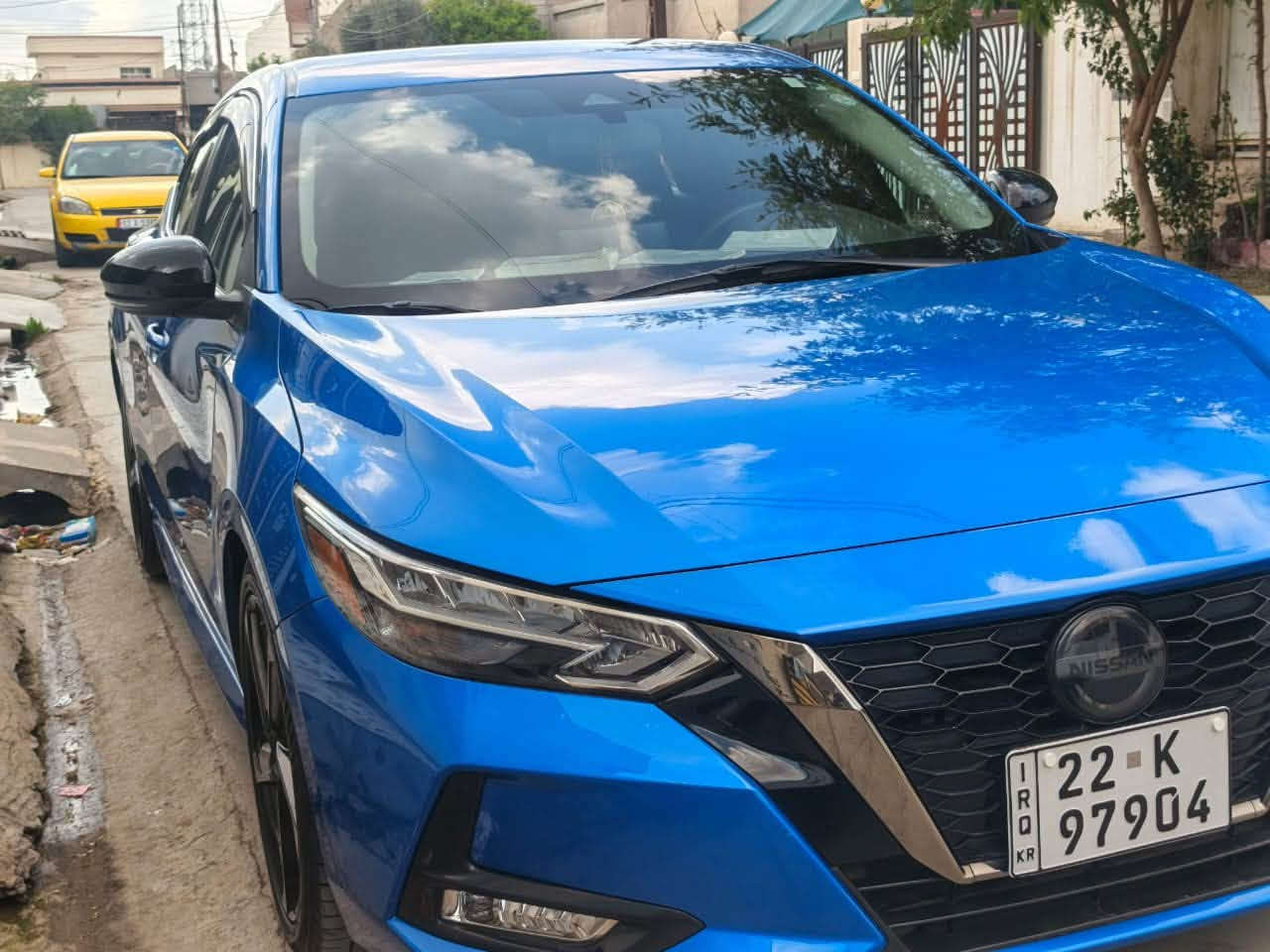 نيسان سينترا 2022  SR اعلى فئة
عداد المسافة : 40  الف ميل  

حجم المحرك : 2000 (4 سلندر)

((((مرقم أربيل وباسمي ))) 

هزه

 جديده لل 2027 تخلص بشهر السابع 

فـــول مـــواصفـــات  عدا الفتحة 

ضربته:: باب وجاملغ  البچم كبس بلادي  

صور الحادث بالمنشور

مواصفات 👇🏻

بصمة ابواب 

بصمة تشغيل 

تشغيل عن بعد 

سستم سماعات  

شاشة دشبول ديجيتال

كاميرا خلفي

اوتو ستارات 

اوتو ستوب رادار امامي

رادار جانبي  (نقاط عمياء)

رادار خلفي (التحذير من الاصطدام) حساسات امامي

حساسات جانبي حساسات خلفي 

نظام (𝐄𝐂𝐎)نظام (𝐍𝐎𝐑𝐌𝐀𝐋)نظام (𝐒𝐏𝐎𝐑𝐓)

تحكمات استيرن تبريد لمس 

تبريد مركزي 

لايتات ليـــLEDـــد عدسة زينون بيلادي 

السعر 132$ و بها مجال قليل

مكان السيارة بغداد حي الجهاد 

متواجد إتصال هاتف وواتساب  ***********
