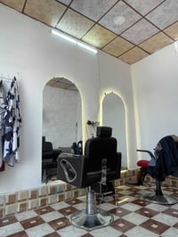 حلاقة رجالي • حلاقة اطفال • مقابل العم اسماعيل