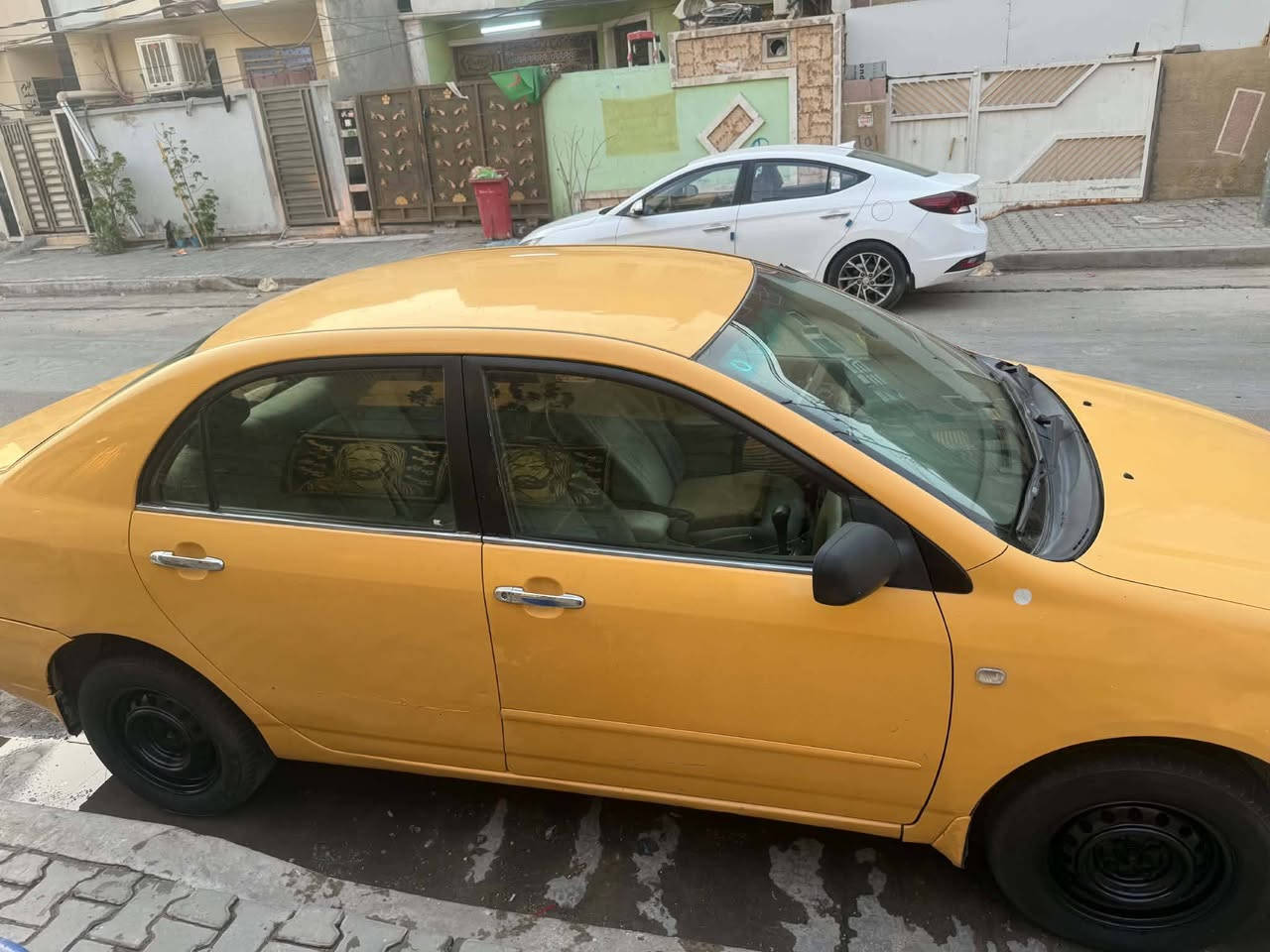 كورلا بكاتشو ٢٠٠٤ محرك  ١٨٠٠ المرغوب   كير تبريد سياره مكفوله من الضربه لغد شاصي تكم كفاله للبيع لو مروس *********** مكاني بغداد
