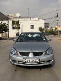 لانسر • ٢٠٠٨ • اوتوماتيك